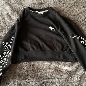 Pink sweatshirt. Size xs. Black with white lettering